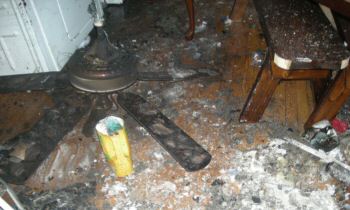 Damaged ceiling and fan